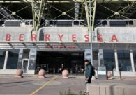 A man standing outside a public transit center in East San Jose