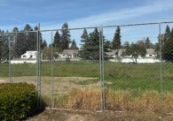 A vacant plot of land that will be developed into housing in San Jose