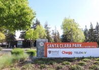 Santa Clara Park entrance sign at Freedom Circle with Stanford health Care, Chegg, and Telenav listed