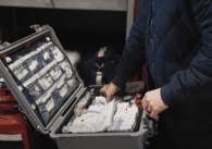 A firefighter with a medication box