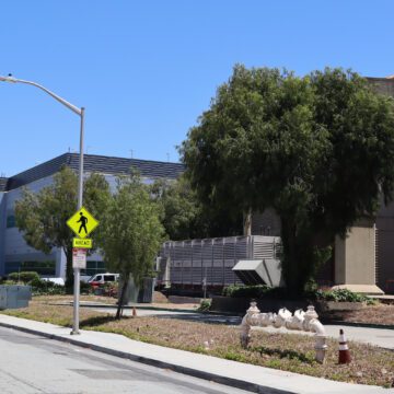 Multiple unmarked buildings along the same street