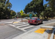 A red sedan drives onto the Highway 17 North entrance in Los Gatos