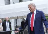 U.S. President Donald Trump speaks to reporters outside
