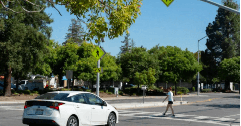 Person walking across the street