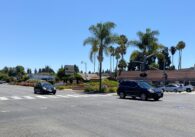 Cars driving on a three lane expressway