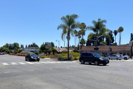 Cars driving on a three lane expressway