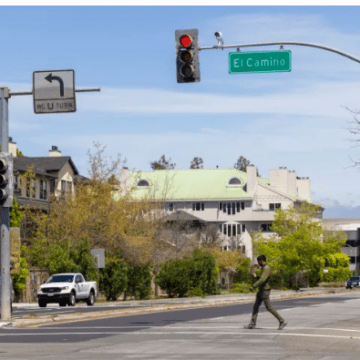 Person walking across the street