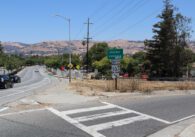 Photo of the highway 101 north entrance on Story road, with the highway and "Freeway entrance" signs visible and cars driving along Story Road in the background