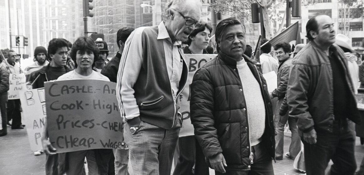 Fred Ross Sr and Cesar Chavez People walking in a protest march in a historic black and white photo