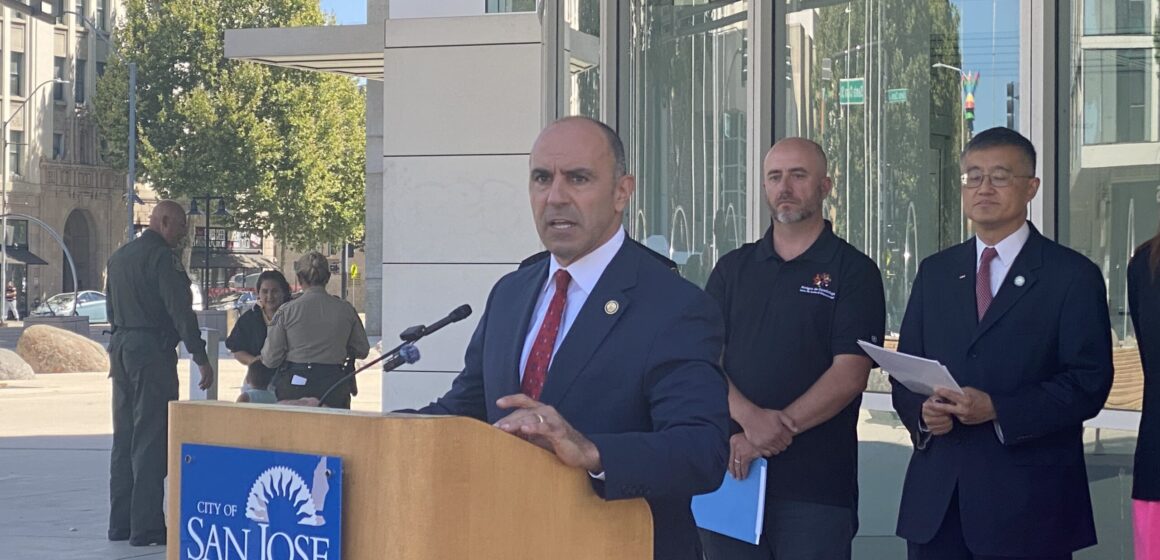 U.S. Congressman Jimmy Panetta speaks at a podium in San Jose, California