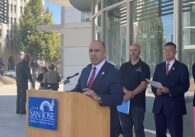 U.S. Congressman Jimmy Panetta speaks at a podium in San Jose, California