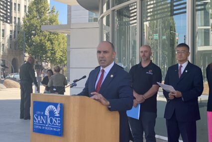U.S. Congressman Jimmy Panetta speaks at a podium in San Jose, California