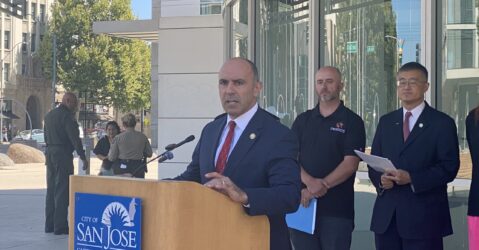 U.S. Congressman Jimmy Panetta speaks at a podium in San Jose, California