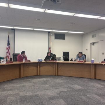 ARUSD NEW SUP Men and women sitting behind a dais at a school board meeting in San Jose, California