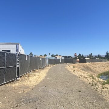 A gravel road next to a creek in San Jose, California