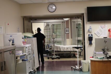 A person stands in the hallway of a hospital in San Jose, California