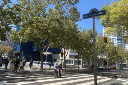 People crossing a street in downtown San Jose, California