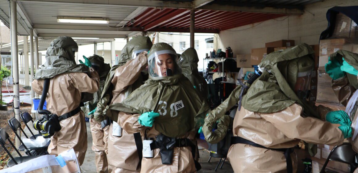 DISASTER People in hazmat suits run a drill for a potential chemical attack in San Jose, California
