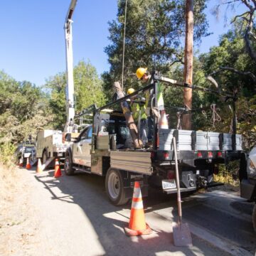 Palo Alto power lines Embarcadero A crew of utility workers putting power lines underground in Palo Alto, California