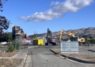 Excavators demolish a vacant former youth center in East San Jose, California