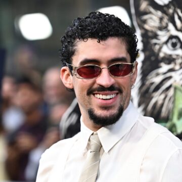 Super Bowl Bad Bunny Music artist Bad Bunny in a shirt and tie wearing sunglasses