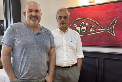 Two men stand inside a restaurant in Sunnyvale, California