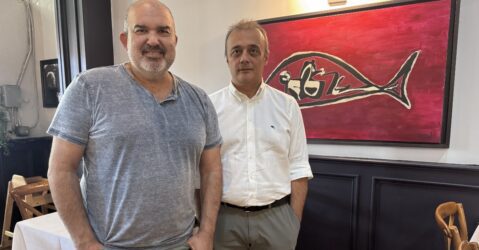 Two men stand inside a restaurant in Sunnyvale, California