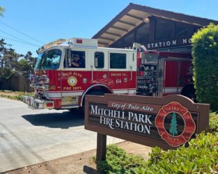 Palo Alto fire station Embarcadero A fire truck parked in the driveway of a fire station in Palo Alto, California