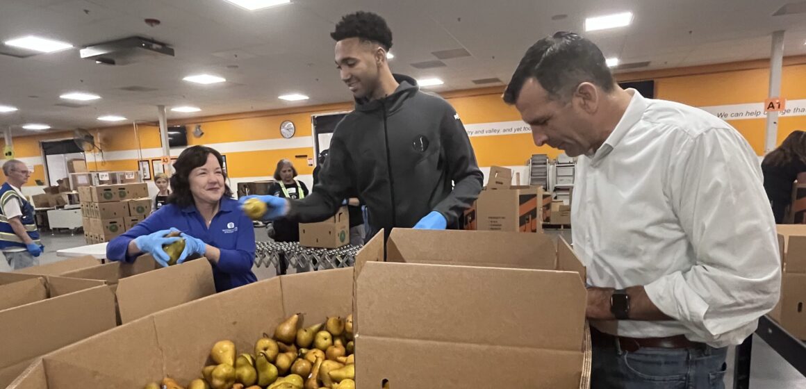 LICCARDO SECOND HARVEST People preparing food donations at a food bank