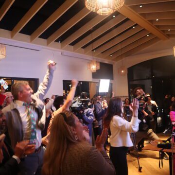 Measure A election night watch party A crowd cheering at an election night watch party in San Jose, California