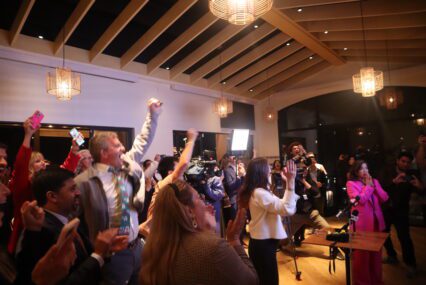 Measure A election night watch party A crowd cheering at an election night watch party in San Jose, California