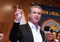 Man speaking in to an audience