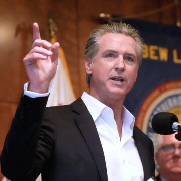 Election 2025 Redistricting California Man speaking in to an audience