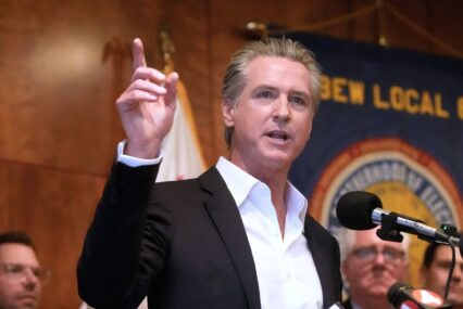 Man speaking in to an audience