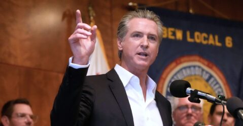 Man speaking in to an audience