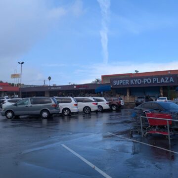 A shopping center with Korean supermarket Super Kyo-Po Plaza.