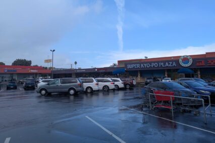 A shopping center with Korean supermarket Super Kyo-Po Plaza.