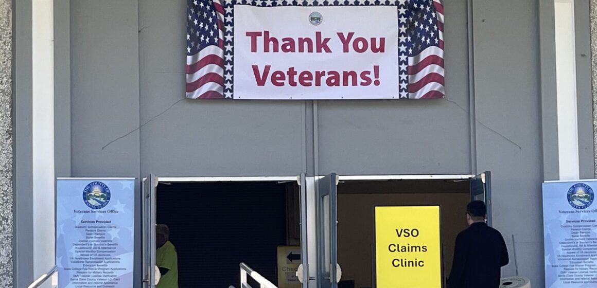 VET RESOURCE FAIR A 'thank you veterans' sign is displayed above a door at a resource fair in San Jose, California