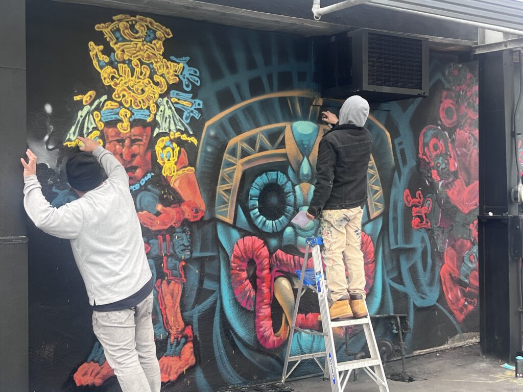 Artists painting murals in East San Jose, California