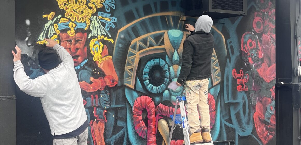 Artists painting murals in East San Jose, California