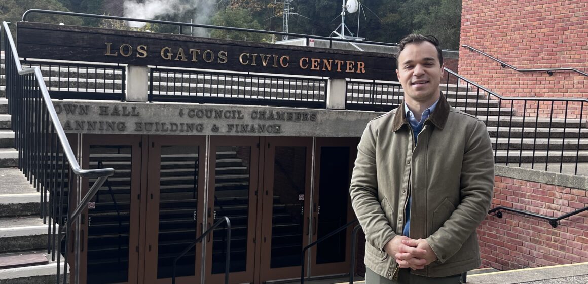 A man stands in front of city hall in Los Gatos, California