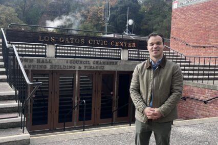 A man stands in front of city hall in Los Gatos, California