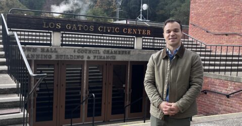 A man stands in front of city hall in Los Gatos, California