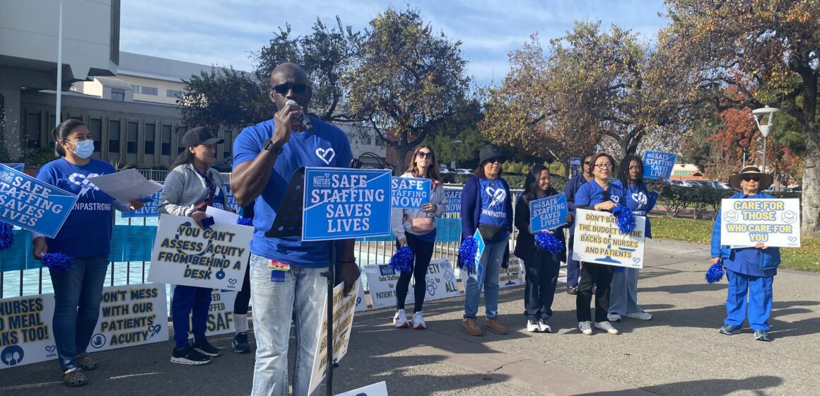 REGIONAL FURLOUGH RALLY SAN JOSE-- ALLAN KAMARA A group of nurses protesting and holding signs outside a hospital in San Jose, California