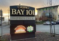 A digital sign for Bay 101 Casino in front of the parking lot for the casino.