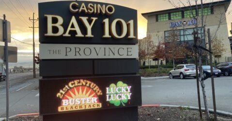 A digital sign for Bay 101 Casino in front of the parking lot for the casino.