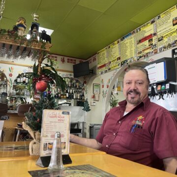 A man sitting at a table in a Mexican restaurant in San Jose, California