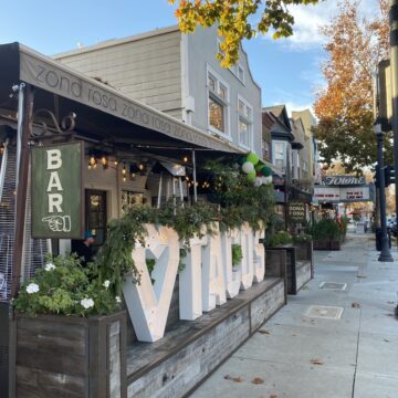 Restaurants and other businesses line a local thoroughfare.