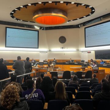 People in audience seating at a government meeting in Santa Clara County, California