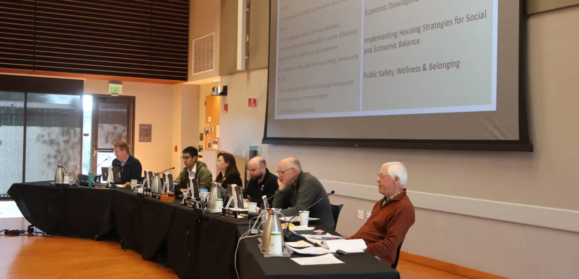 People sitting on a podium